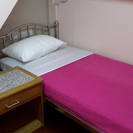 Ocean Pearl Inn - 3 Γιανγκόν Δωμάτιο φωτογραφία